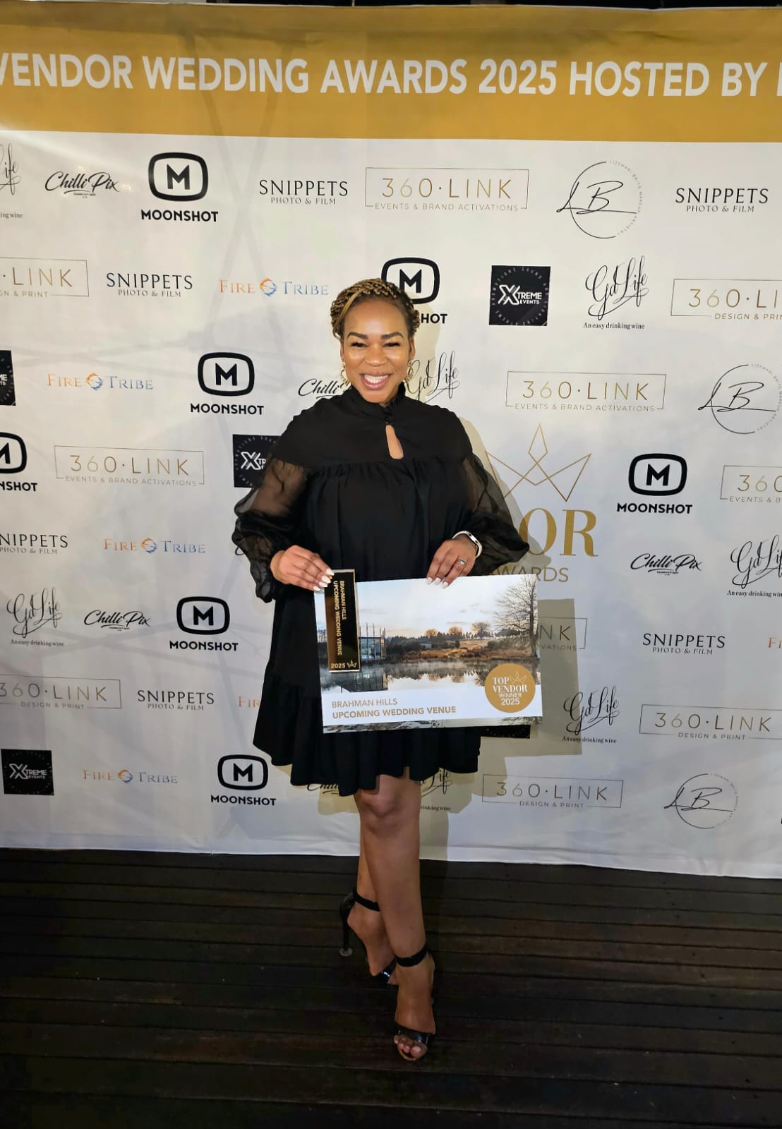 Onwaba Gonyora – proudly holding the TopVendor Best Upcoming Wedding Venue award on behalf of Brahman Hills